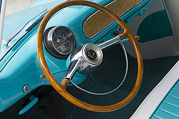 Steering wheel and Speedo / Dash image.
  